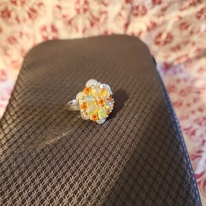 Elegant Silver and Orange Floral Ring